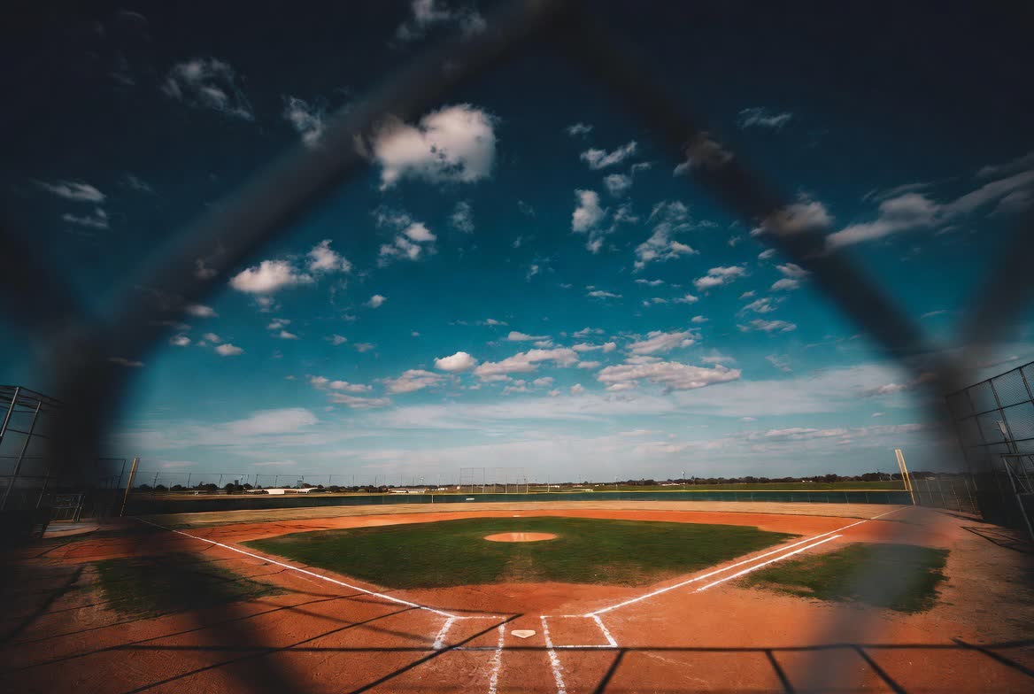 Baseball diamond viewed through the backstop