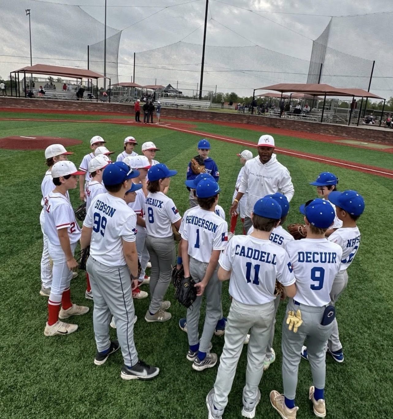 Coach C huddling with Prospect players